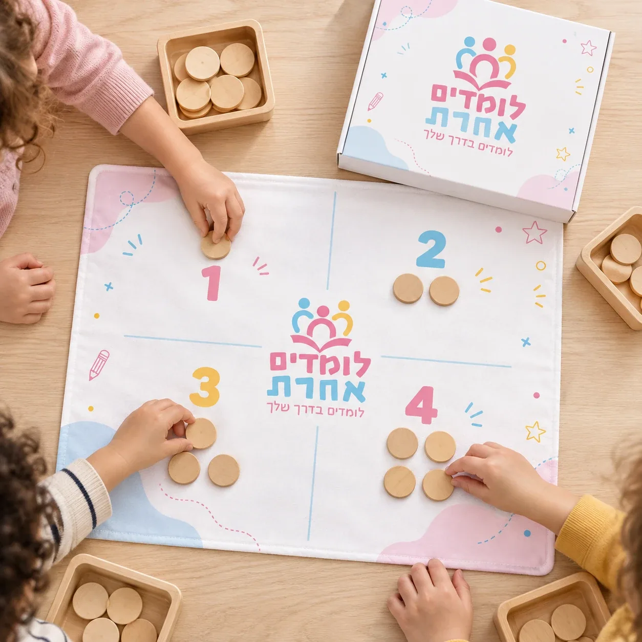 Children counting wooden tokens on a Lomdim Acheret mat